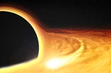 Artist's impression shows hot gas orbiting in a disk around a rapidly-spinning black hole.