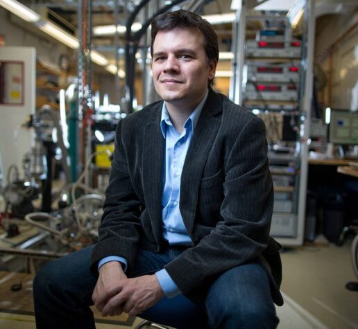 Pablo Jarillo-Herrero sitting in his laboratory