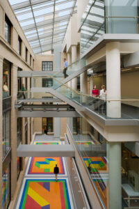 Photo displaying physics buildings 6 (left) and 6C (right) as well as Sol LeWitt's artwork Bars of Color within Squares (2007).