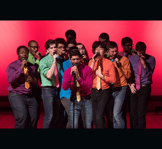 Photo showing MIT senior Shaun Datta, at center performing with his fellow MIT Logarhythms.