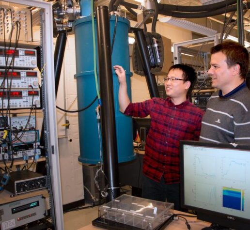 MIT researchers Sanfeng Wu, left, a postdoc at MIT, and Pablo Jarillo-Herrero, the Cecil and Ida Green Professor of Physics in lab.
