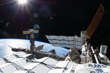 Shows AMS detector on the International Space Station