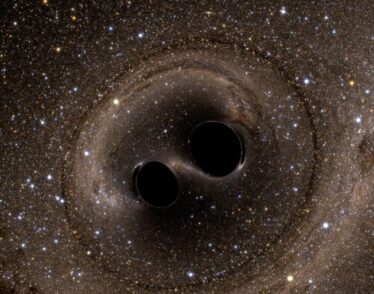 A computer simulation shows the collision of two black holes, detected for the first time by the Laser Interferometer Gravitational-Wave Observatory (LIGO) in 2015.