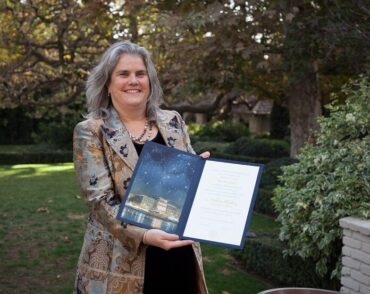Andrea Ghez '87 poses with her Nobel diploma