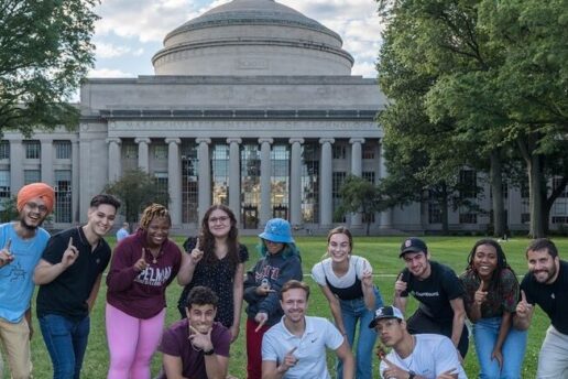 Prospective MIT graduate students pose in Kilian Court.