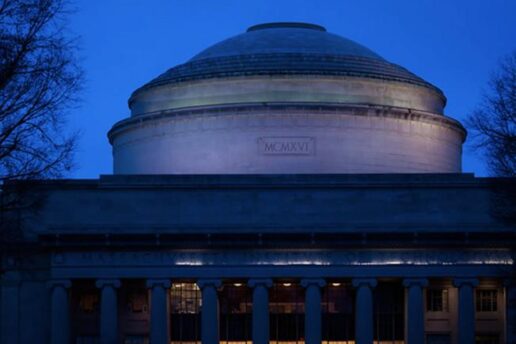 An image at night of the Great Dome on the MIT campus