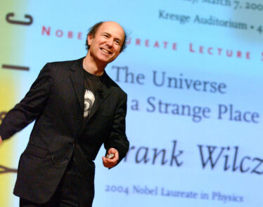 Frank Wilczek on stage at a Nobel Laureate Lecture