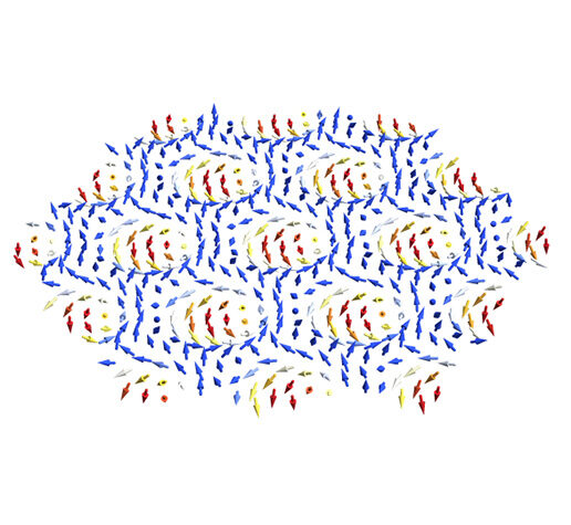 Artist’s rendition of skyrmions, exotic particles represented by the whirls of red, yellow, and white arrows.