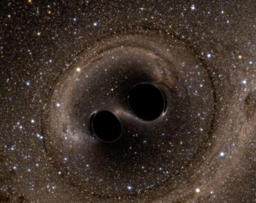 The collision of two black holes holes is seen in this still from a computer simulation.