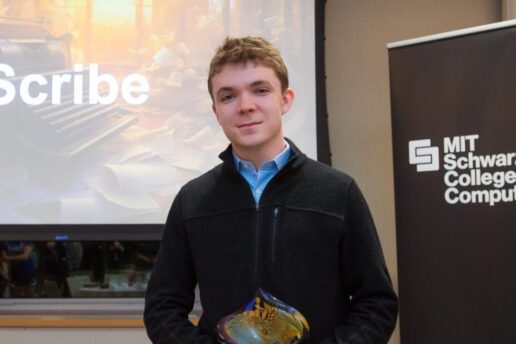 Student poses with award they won.