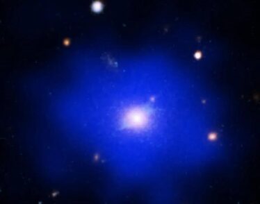 SPT2215 relaxed galaxy cluster in composite image by Chandra, Hubble, and other space instruments