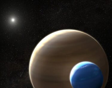 An illustration of a large moon circling a gas-giant planet around a distant star.