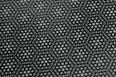 one graphene lattice rotates above another