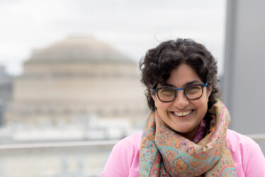 Nergis Mavalvala poses in front of MIT dome