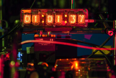 Photo of clock with glowing numbers