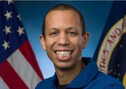 A photograph of Christopher Williams in his NASA flight suit