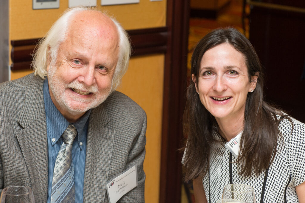 man and woman pose for photo