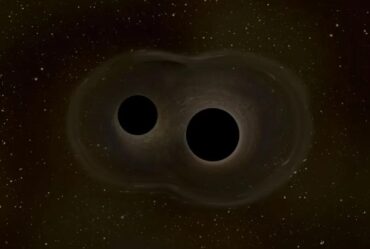 An illustration shows two black holes relatively close to each other against a starry space background.
