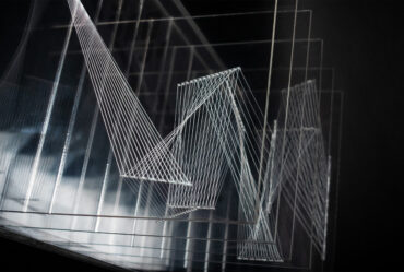 A layered sculpture resembling zig-zag patterns and geometric shapes