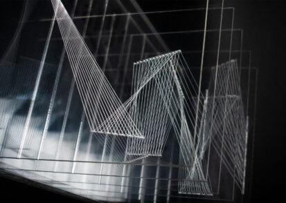 A layered sculpture resembling zig-zag patterns and geometric shapes