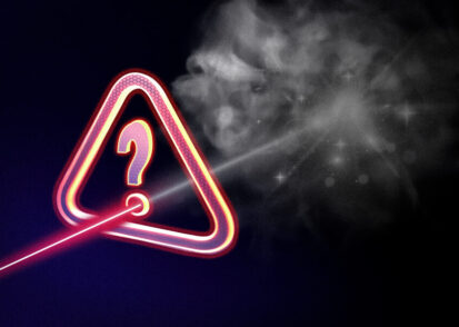 A red laser turns grey and fizzles out when passing through an “question mark” error message.